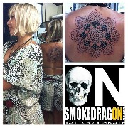 Smokedragon tattoo e piercing